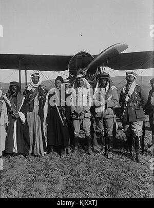 Britishers, Bedouins and Circassians with airplane. Sir Herbert Samuel's second visit to Transjordan Stock Photo