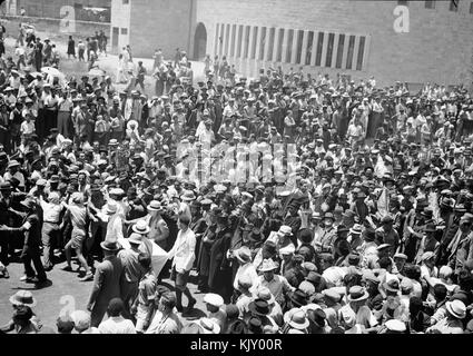 Jewish protest demonstrations against Palestine White Paper, May 18, 1939. Orthodox Jews leaving the Yeshuru Synagogue carrying the Holy Scrolls of the Law Stock Photo