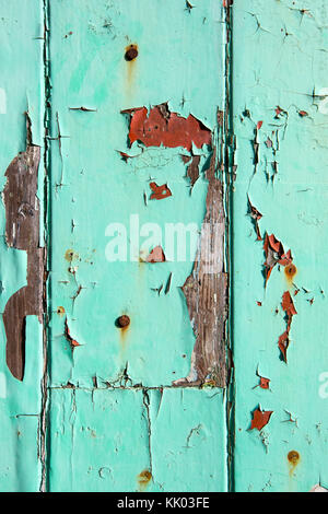 Flaking paint on a wooden door Stock Photo