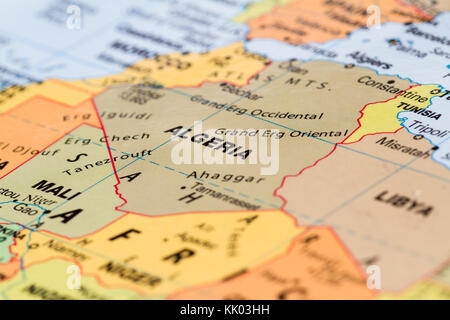 close up of a world map with the word Algeria in focus Stock Photo