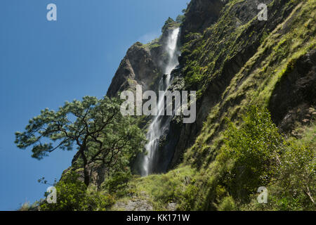 Waterfall in the lush Tsum Valley, Nepal Stock Photo