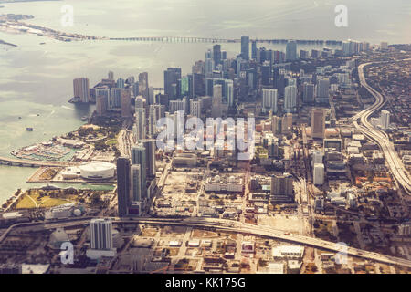 Aerial view of Miami from the aircraft. In the background of skyscrapers in the district of Wynwood. Florida, USA Stock Photo