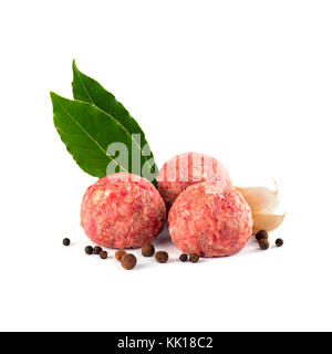 Composition with raw meatballs on the white background Stock Photo
