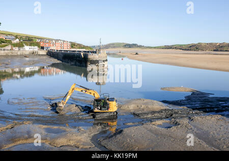 Dredging work to clear silt from entrance to Padstow Harbour on the River Camel Cornwall UK Stock Photo