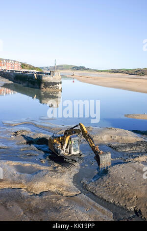 Dredging work to clear silt from entrance to Padstow Harbour on the River Camel Cornwall UK Stock Photo