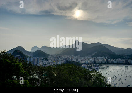 Photo taken in Rio de Janeiro, Brazil August 2017: View from Sugarloaf Mountain over the City during sunset Stock Photo