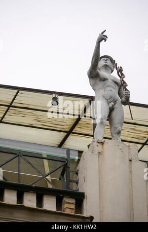 A statue of Mercury / Hermes with Caduceus winged staff and serpents Stock Photo