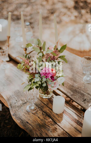 Wedding decorations on old wooden table Stock Photo