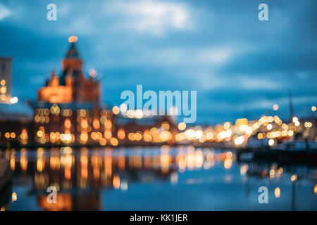 Helsinki, Finland. Abstract Blurred Bokeh Architectural Urban Background Of Uspenski Cathedral And City Embankment. Real Defocused Colorful Backdrop L Stock Photo