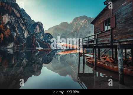 Boats on the Braies Lake ( Pragser Wildsee ) in Dolomites mountains, Sudtirol, Italy Stock Photo