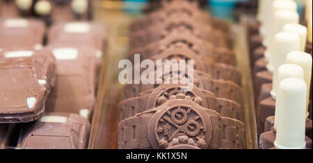 Chocolate formed in wrist watch. Selective focus Stock Photo