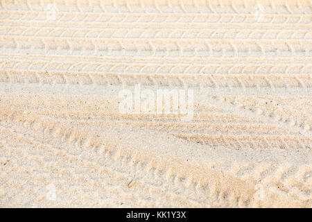 numerous tire tracks in the sand at a Southampton ocean beach, southampton, ny Stock Photo