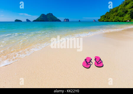 Pink Flip Flops On Shore At Aonang Beach Stock Photo