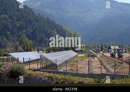 solar panels construction site on mountain Stock Photo