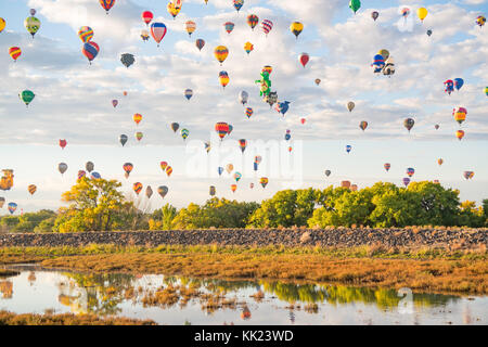 ALBUQUERQUE, NM - OCTOBER 13: Balloons fly over Albuquerque during Albuquerque Balloon Festival on October 13, 2017