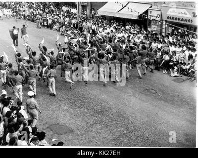 Zvi Oron (Oroshkess). Yom Ha'Atsma'ut (Israel Independence Day) parade in Jerusalem. School children dancing on Jaffa Road. 1960 (id.14457788) Stock Photo