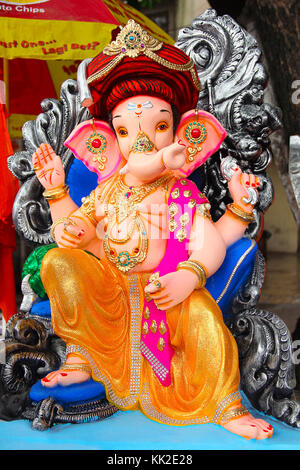 Lord Ganapati sculpture wearing Puneri Pagadi, during Ganesh Festival, Pune Stock Photo