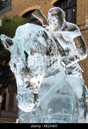 London, UK. 27th Nov, 2017. Life Sized sculpture of 'Caesar' on Horseback, made entirely of Ice, towers over Londoners to celebrate the release of 'War for the Planet of the Apes' on DVD and BluRay. Seven Dials, Covent Garden, London on November 27th 2017 Credit: KEITH MAYHEW/Alamy Live News Stock Photo