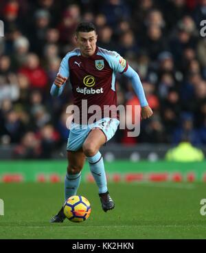 MATTHEW LOWTON BURNLEY FC BURNLEY V ARSENAL PREMIER LEAGUE TURF MOOR, BURNLEY, ENGLAND 26 November 2017 GBB5760 STRICTLY EDITORIAL USE ONLY. If The Player/Players Depicted In This Image Is/Are Playing For An English Club Or The England National Team. Then This Image May Only Be Used For Editorial Purposes. No Commercial Use. The Following Usages Are Also Restricted EVEN IF IN AN EDITORIAL CONTEXT: Use in conjuction with, or part of, any unauthorized audio, video, data, fixture lists, club/league logos, Betting, Games or any 'live' services. Also Restricted Are Usages In P Stock Photo