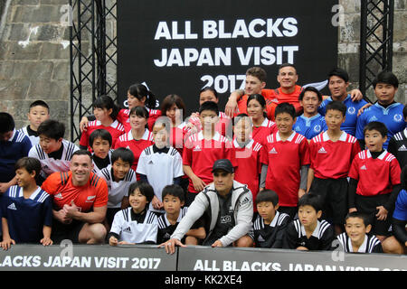 Yokohama, Japan. 28th Nov, 2017. New Zealand's All Blacks rugby team members pose for photo with Japanese rugby players for the DFY, a kind of touch rugby game in Yokohama, suburban Tokyo on Tuesday, November 28, 2017. Five All Blacks members are now in Japan for the promotion of German sports equipment maker Adidas. Credit: Yoshio Tsunoda/AFLO/Alamy Live News Stock Photo