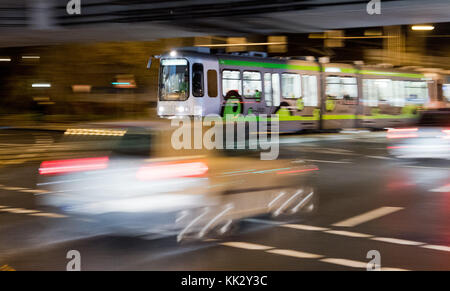 ATTENTION: EMBARGOED FOR PUBLICATION UNTIL 29 NOVEMBER 11:00 GMT! - A tram of the Uestra Hannoversche Verkehrsbetriebe (lit. public transport in Hanover) crosses the Hildesheimer Strasse (Hildesheim Street) in Hanover, Germany, 27 November 2017. The General German Automobile Club (ADAC) examined city resident's satisfaction with the respective mobility offer - car drivers, participants of public transport and pedestrians. The survey 'Mobil in der Stadt' (lit. mobile in the city) will be presented in Berlin on 29 November 2017. (ATTENTION EDITORS: EMBARGOED UNTIL 29 NOVEMBER 2017 · 11AM) Phot Stock Photo