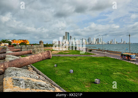 view over cannon of old town to skyline of new district Bocagrande, Cartagena de Indias, Colombia, South America Stock Photo