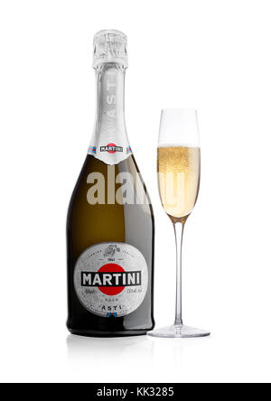 LONDON, UK - November 24, 2017: Bottle and glass of sparkling wine Martini Asti on white background. Produced in Italy Stock Photo