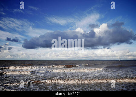 Storm clouds over a dark rough sea in winter Stock Photo