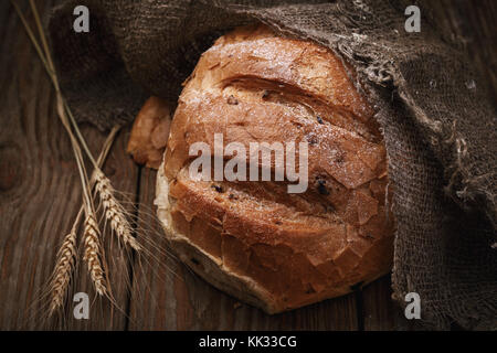 Freshly prepared spicy bread on a wooden table Stock Photo