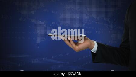 Digital composite of Bitcoin icons and hand holding tablet Stock Photo