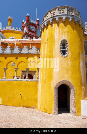 The view of the Clock tower and the chapel of the the original Monastery of the Hieronymite monks. Pena Palace. Sintra. Portugal Stock Photo