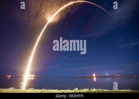 SpaceX's Falcon 9 rocket launched the AsiaSat 6 satellite to a geosynchronous transfer orbit in the early morning hours of Sunday, September 7th, 2014. Stock Photo