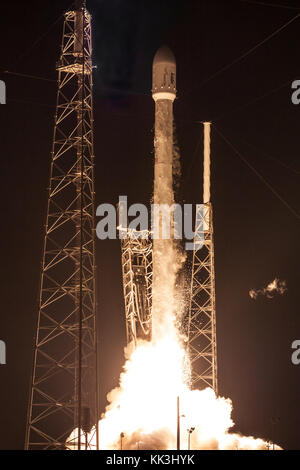 SpaceX's Falcon 9 rocket launched the AsiaSat 6 satellite to a geosynchronous transfer orbit in the early morning hours of Sunday, September 7th, 2014. Stock Photo