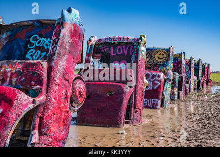 AMARILLO, TX-OCTOBER 12: Old Cadillac cars burried at the famous Cadillac Ranch Ranch along historic Route 66 near Amarillo, TX on October 12, 2017 Stock Photo