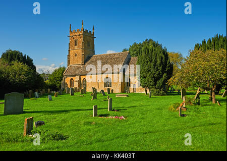 The small parish church of St George in the Cotswold village of Didbrook on a late summer afternoon Stock Photo