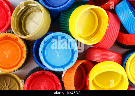 many plastic covers of different colors scattered Stock Photo