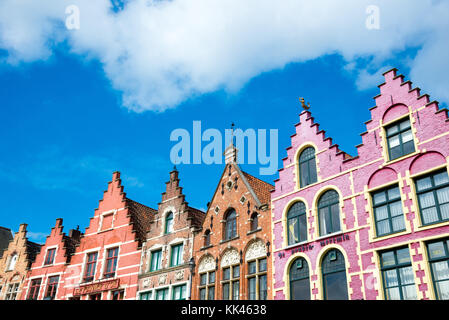Colorful old brick houses in the Market Square in the UNESCO World Heritage Old Town of Bruges, Belgium Stock Photo