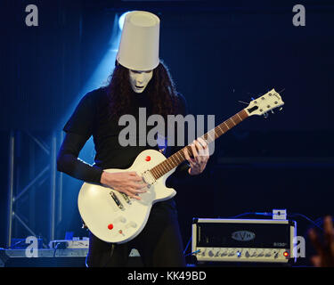 FORT LAUDERDALE, FL - FEBRUARY 28: Brian Patrick Carroll AKA Buckethead performs at The Culture Room. Brian Patrick Carroll (born May 13, 1969), known professionally as Buckethead, is an American guitarist and multi-instrumentalist who has worked within many genres of music. He has released 264 studio albums, four special releases and one EP. He has also performed on more than 50 other albums by other artists. His music spans such diverse areas as progressive metal, funk, blues, jazz, bluegrass, ambient, and avant-garde music. Buckethead is famous for wearing a KFC bucket on his head, emblazon Stock Photo