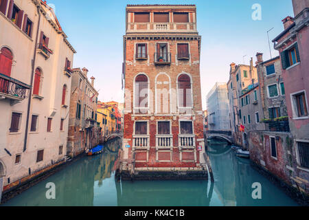 Venice. Cityscape image of narrow canals in Venice during sunset.