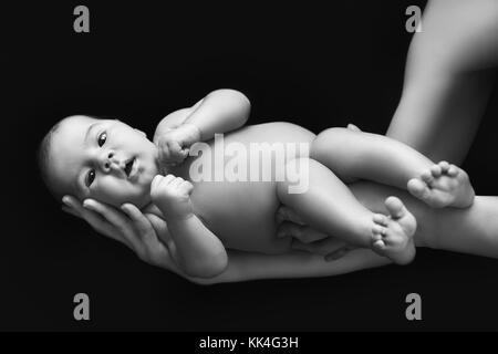 black and white photo of newborn baby Stock Photo