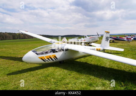 PLASY, CZECH REPUBLIC - APRIL 30: Aerobatic two-seat all-metal Let L-13AC Blanik glider for dual aerobatic training stands on airfield April 30, 2017  Stock Photo