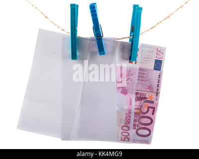 Euro notes laundering on clothesline isolated on white Stock Photo