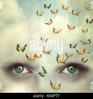 Two eyes with the sky and so many butterflies flying on the forehead Stock Photo