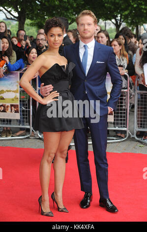 Gugu Mbatha-Raw and Australian-British actor Sam Reid attend the UK premiere of Belle at BFI Southbank in London. 5th June 2014 © Paul Treadway Stock Photo