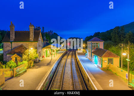 CORFE, UNITED KINGDOM - SEPTEMBER 08: This is a night view of the Corfe Castle railway station traditional medieval architecture and train tracks on S Stock Photo