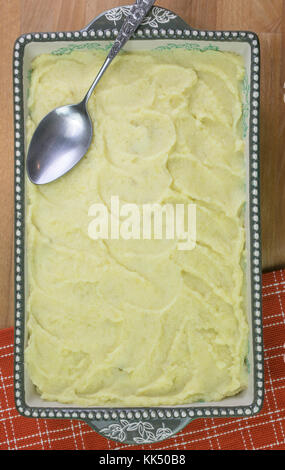 Preparation of Shepherd's Pie made with ground beed, vegetables and mashed potatoes Stock Photo