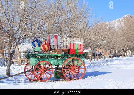 Cart with big Christmas presents. Christmas decorations Stock Photo