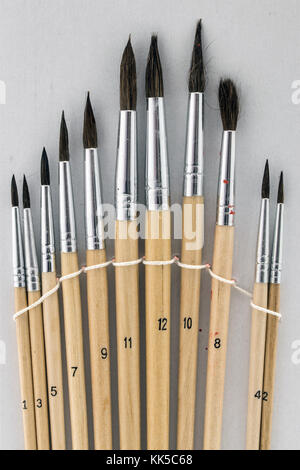 Set of Old and Used Paint Brushs in different sizes, close up Stock Photo