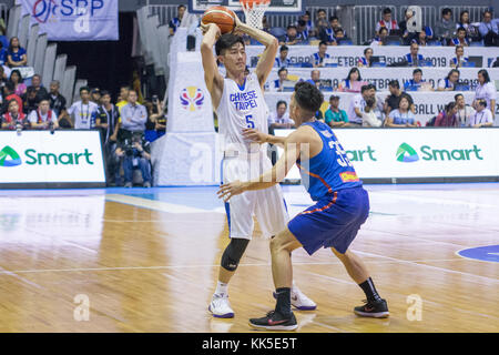 Cubao, Quezon City, Philippines. 27th Nov, 2017. Cheng Liu defended by Matthew Wright Gilas Pilipinas defended their home against Chinese Taipei. Game ended at 90 - 83. Credit: Noel Jose Tonido/Pacific Press/Alamy Live News Stock Photo