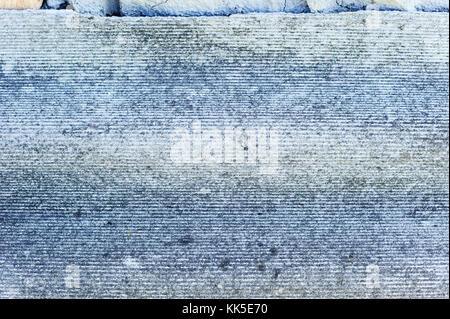 Slate texture. Horizontal gray furrows. Stock Photo